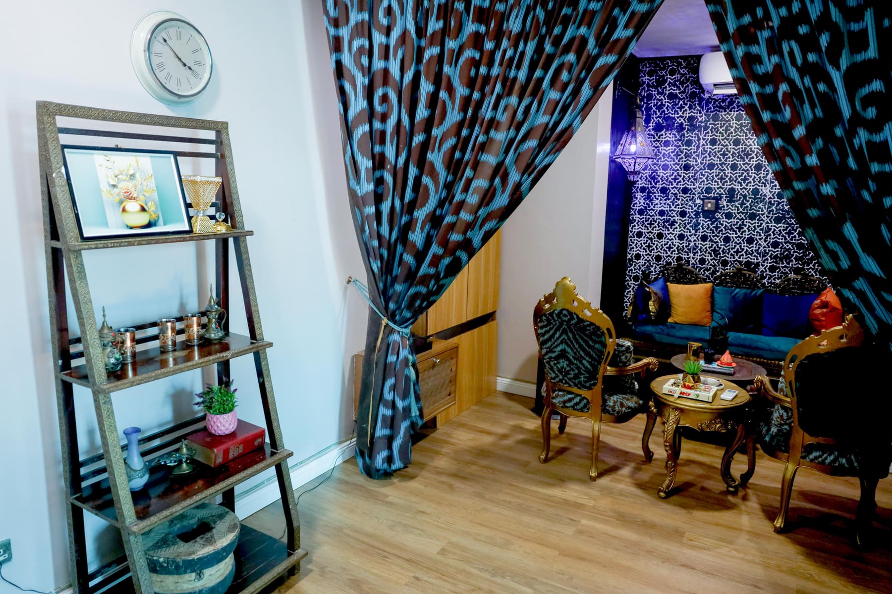 A quiet, dimly lit private room inside Glamour Lounge, set apart from the noise of Lagos